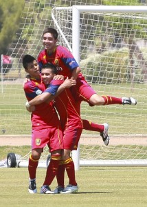 RSL-AZ U16 celebrating a goal against the Strikers FC