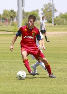 RSL-AZ U18 Player, Danny Gavin weaving around Strikers FC
