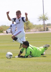 RSL-AZ pushing the soccer ball towards the goalkeeper