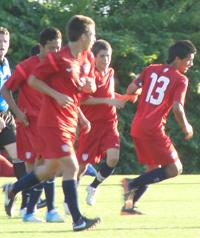 US Under-15 Boys National Soccer Team celebrates a goal.